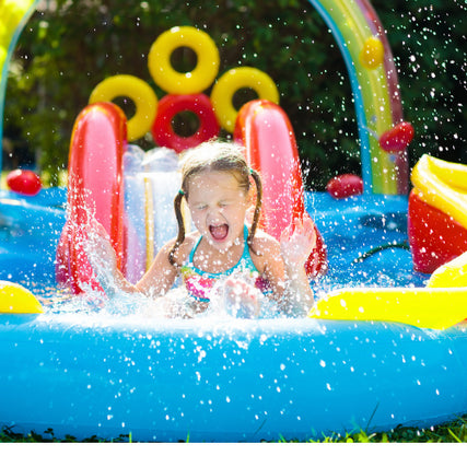 Party / Event RentalsGirl sliding down a slip n slide splashing water